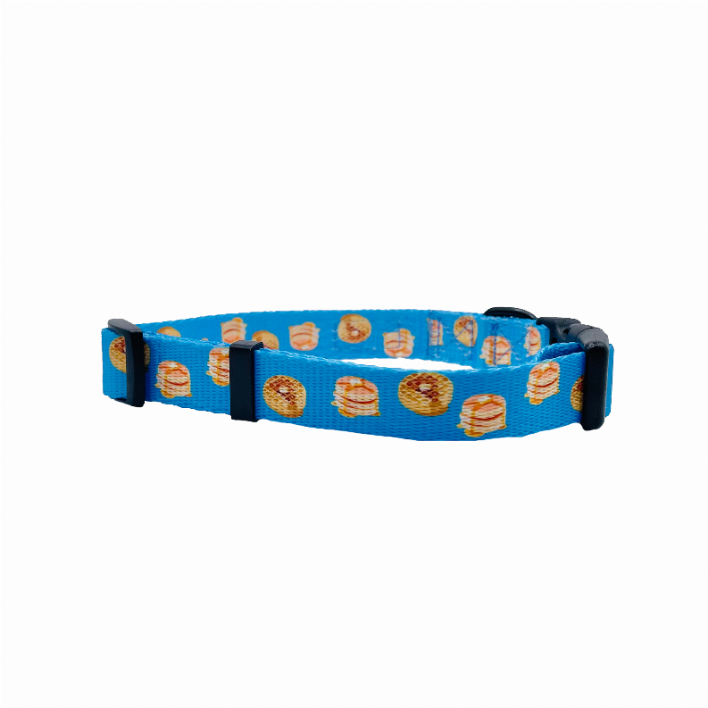 Blue fabric dog collar with repeating hamburger design and black side fasteners