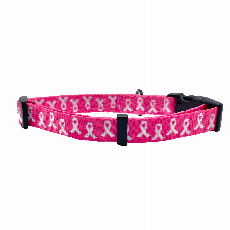 Pink dog collar with black buckle and keeper strap, patterned fabric, side view