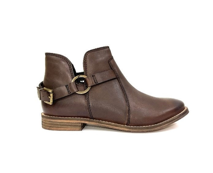 Dark brown ankle bootie with front strap, ring buckle, and short block heel
