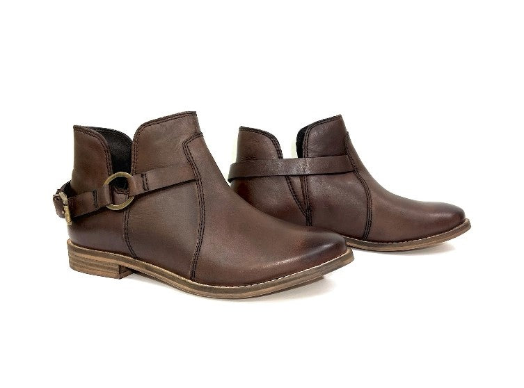 Dark brown ankle booties with cuff tab and ring buckle, low wooden-look block heel