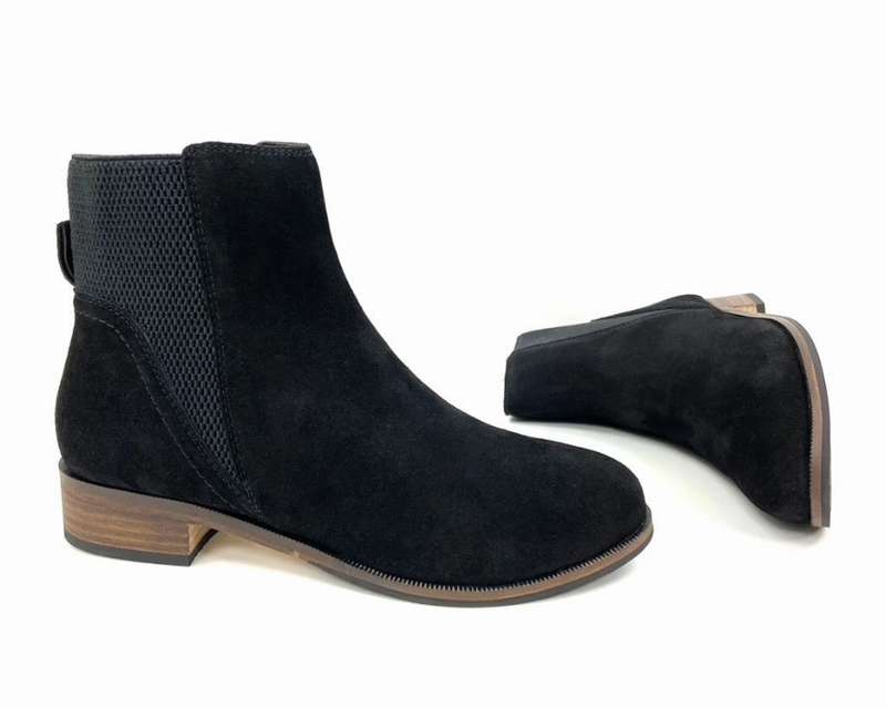 Black suede Chelsea boot side view with elastic gore and low block heel.