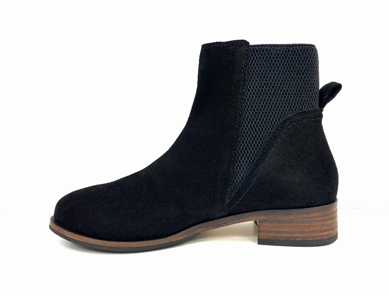 Black suede Chelsea bootie with elastic side panels and wood-look block heel