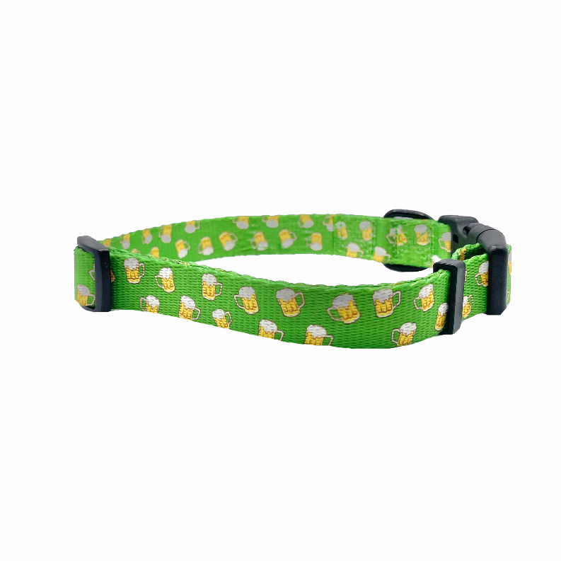 Green dog collar with cactus and dog faces pattern, black buckle