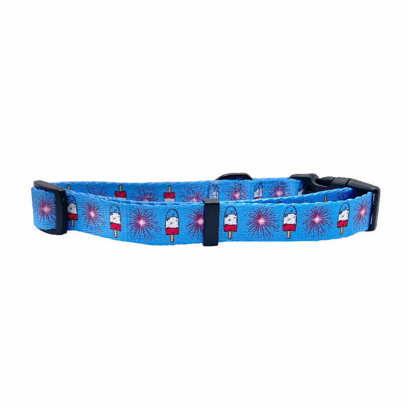 Blue dog collar with black buckle and fun popsicle-and-sparkler pattern
