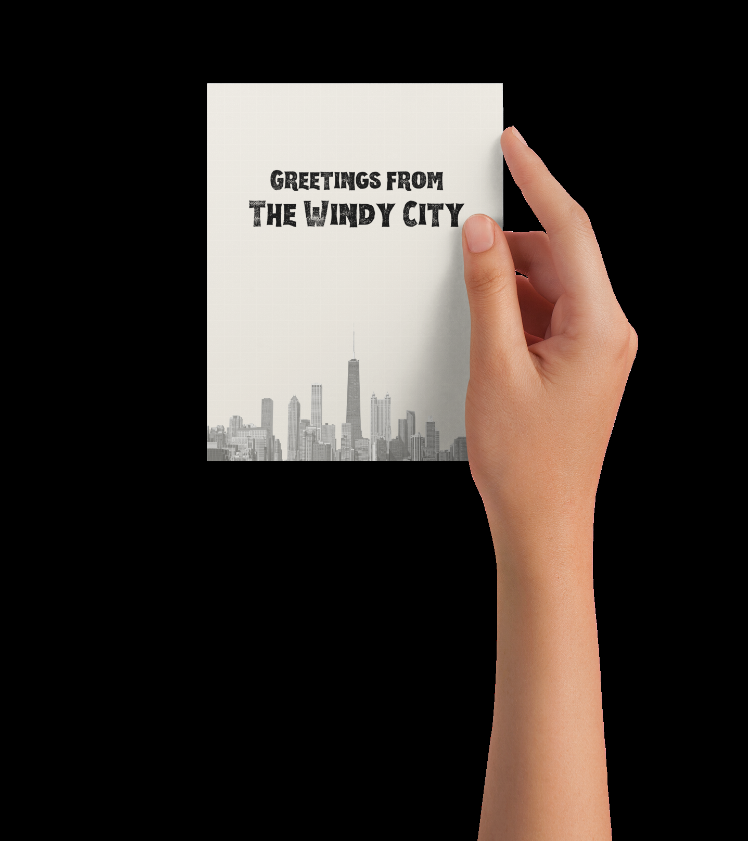 Greeting card front held by hand, “Greetings From The Windy City” over skyline