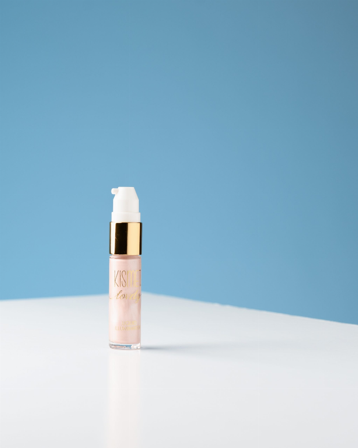 Liquid illuminator bottle with white pump and light rose-pink glossy serum