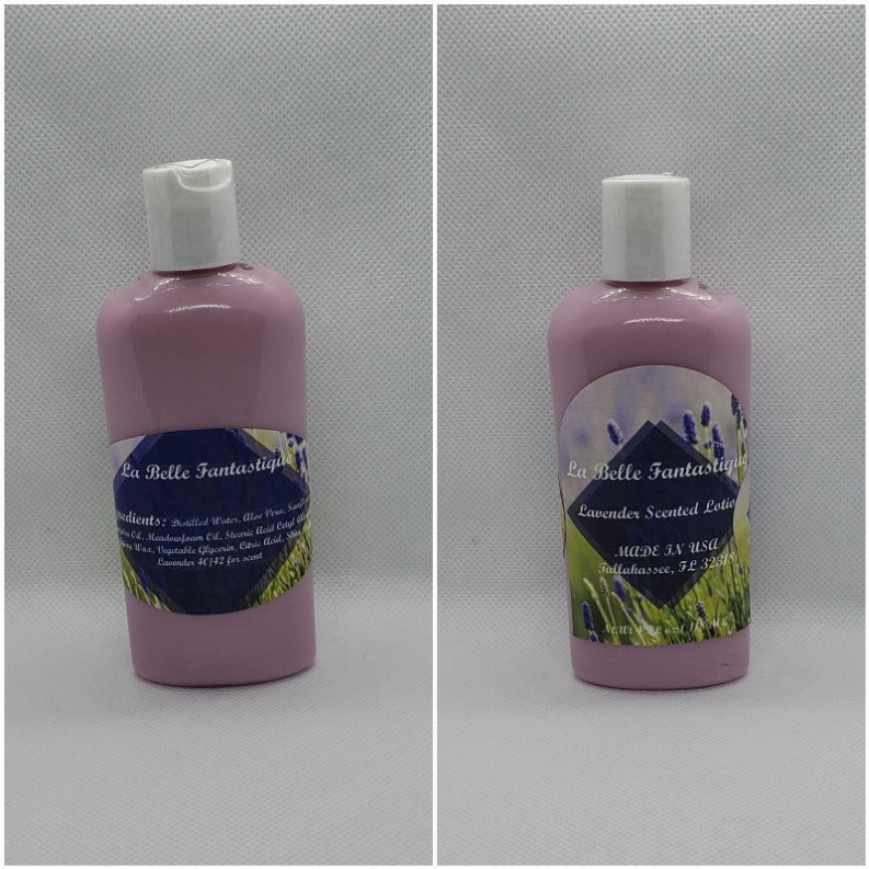 Lavender lotion bottle, pink bottle with white cap and front label reading La Belle Fantastique