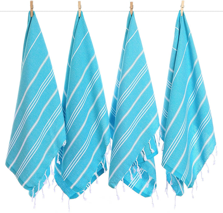 Set of striped turquoise hand towels with white lines and fringed ends, clipped up.