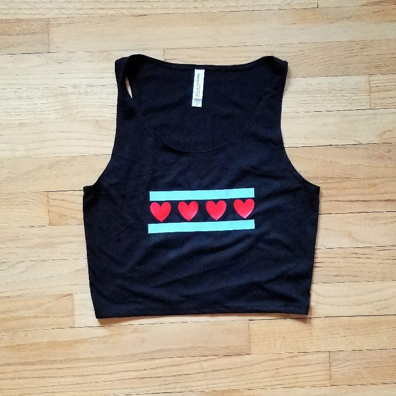 Dark sleeveless crop top with scoop neck; horizontal heart flag stripe on chest