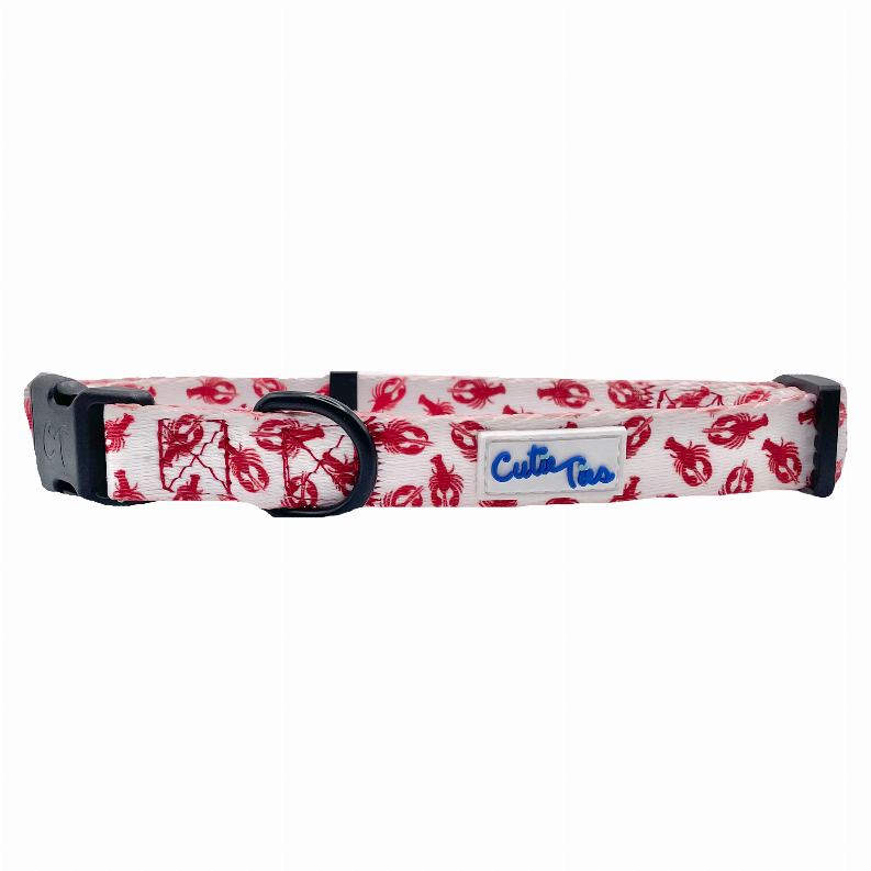 Red lobster-print dog collar with black end cap, buckle and D-ring