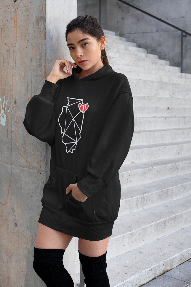 Black hooded pullover dress with chest graphic, long sleeves, and kangaroo pocket.
