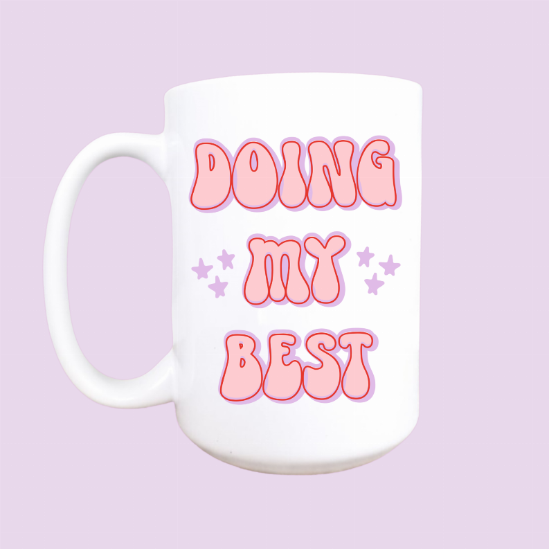 White ceramic coffee mug with red “Doin my best” text and star accents, 15oz
