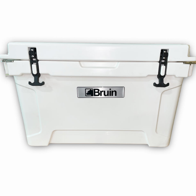 White roto-molded cooler with black tie-down brackets and Bruin logo on front