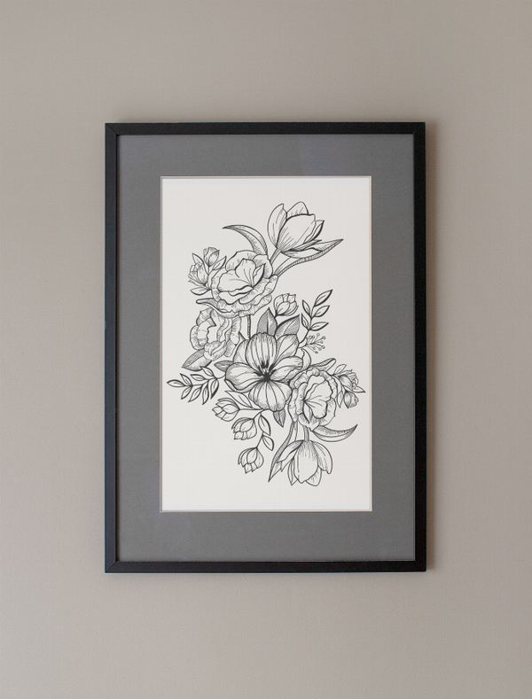 Framed floral line art print with black-and-white flower line drawing