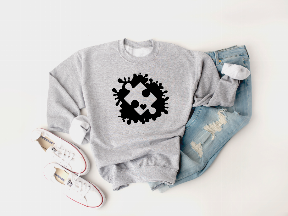 Heather gray sweatshirt front with black puzzle-piece autism graphic