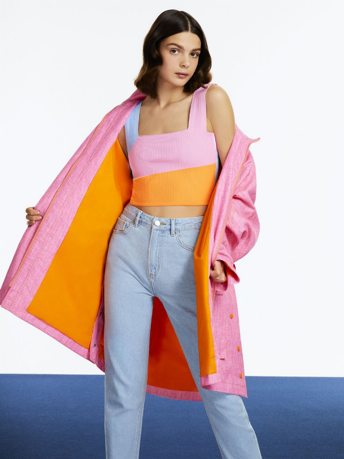 Ice blue high-waisted mom jeans, relaxed straight fit with button fly and pockets.