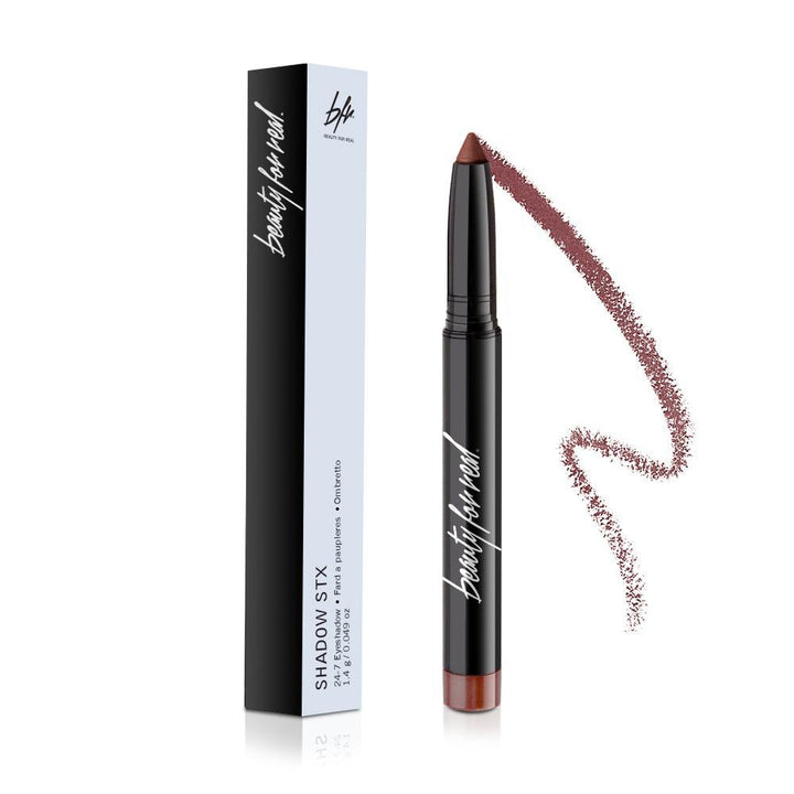 Eye shadow crayon with matching box; shimmery brown pencil