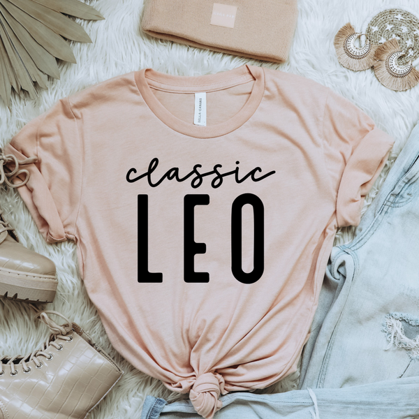 Peach crew-neck t-shirt with 'classic LEO' graphic, short sleeves