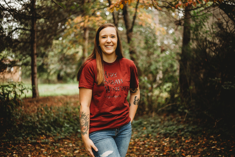 Red unisex crew-neck T-shirt with front typography print of Mary Sarah Winifred