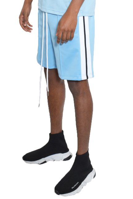 Light blue front-pleat shorts with white vertical stripe trim and drawstring ties