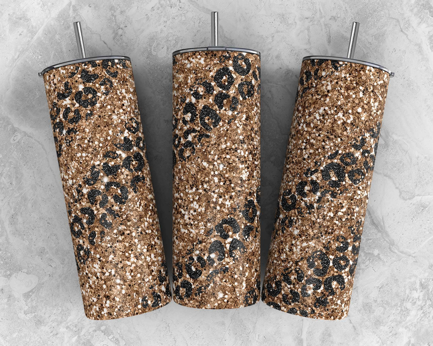 Stainless steel tumbler with gold glitter finish and black speckled pattern