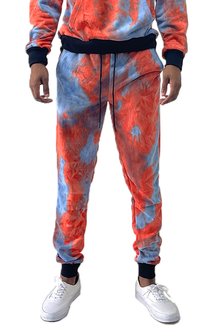 Tie-dye sweatpants in blue and pink with elastic cuffs and waistband