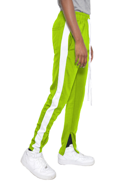 Lime green slim-fit track pants with white side stripe and drawstring waist
