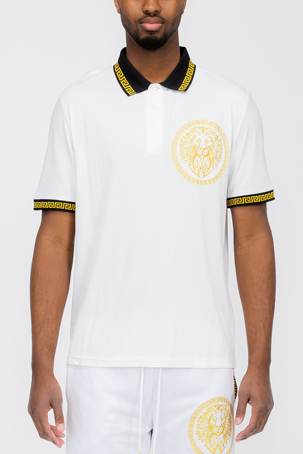White polo shirt with lion head crest and yellow striped collar and cuffs