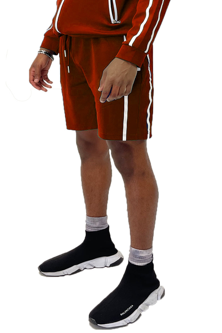 Red running shorts with white side tape stripes, elastic waistband and drawstring