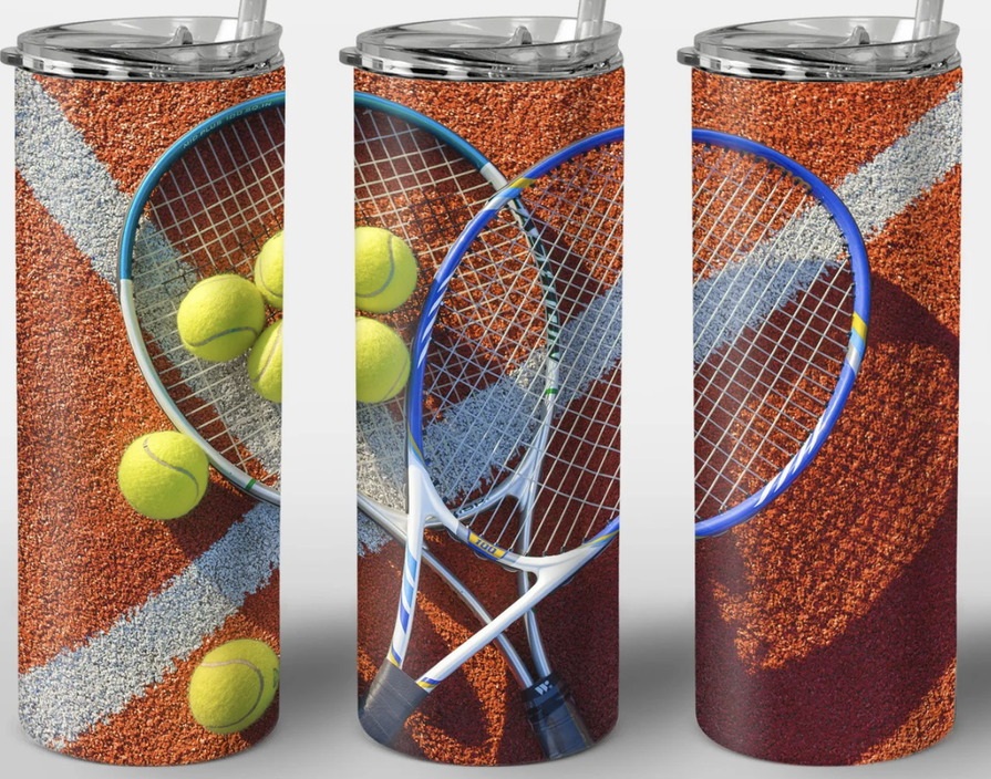 Stainless steel tumbler with speckled orange-and-gray print, blue lid and straw, tennis ball graphic