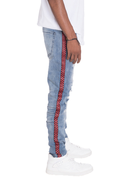 Blue denim jeans with red-and-black check stripe down the leg