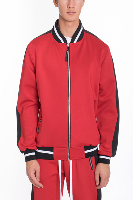 Red track jacket with black trim, ribbed collar cuffs, and front zip closure