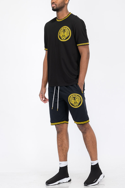 Black T-shirt and shorts set with yellow lion head emblem and trim, crew neck