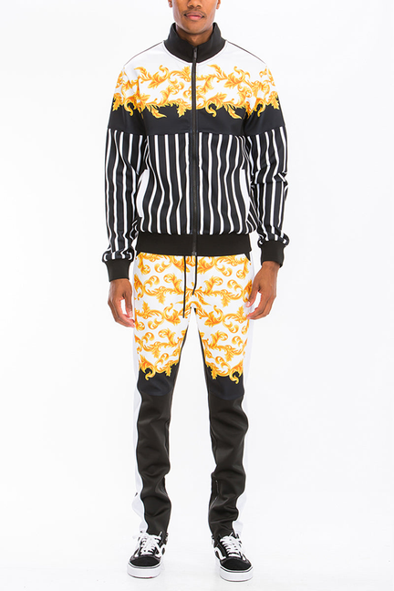 Printed track jacket and pants set with orange-gold scroll print and black-and-white stripes