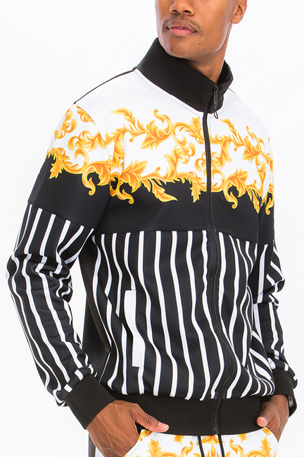 Printed half-zip track jacket with orange-gold scroll print and black-and-white stripe sections