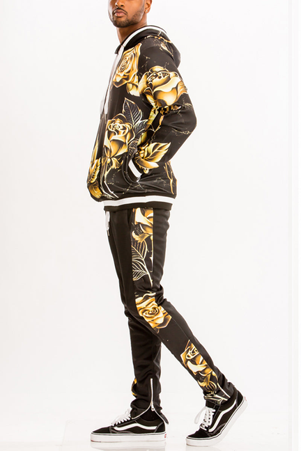 Black printed sweat set side view: gold rose/leaf hoodie with tapered jogger pants.