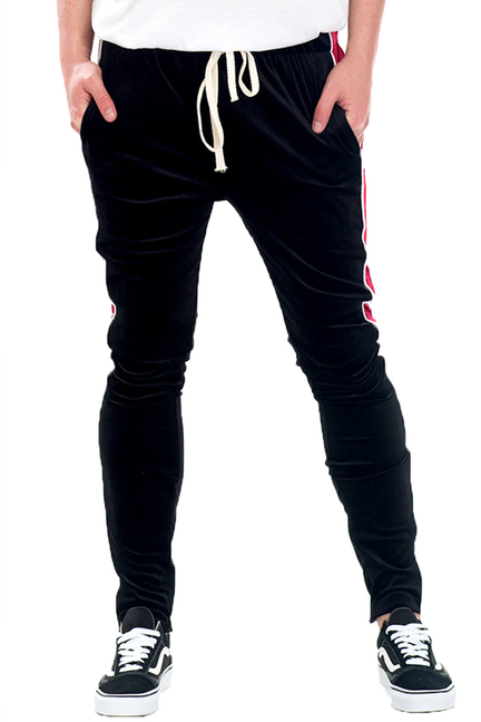 Black velvet pants with white drawstring waist and tapered legs