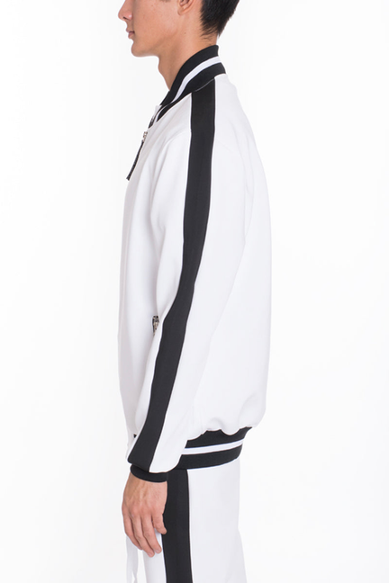 White track jacket side profile with black stripe panel and front zip