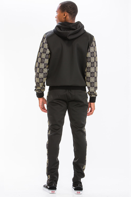 Printed track set back view, black zip hoodie with hood and gold geometric sleeves