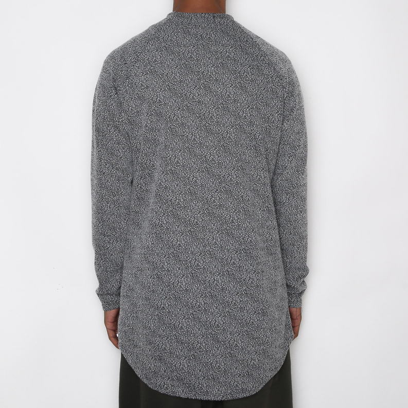 Raglan baseball tee with heather gray back and curved scalloped hem