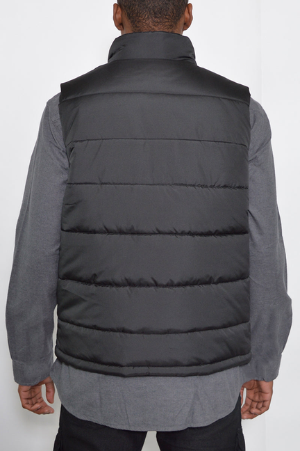 Quilted padded sleeveless vest, dark, with stand collar and stitched back panels