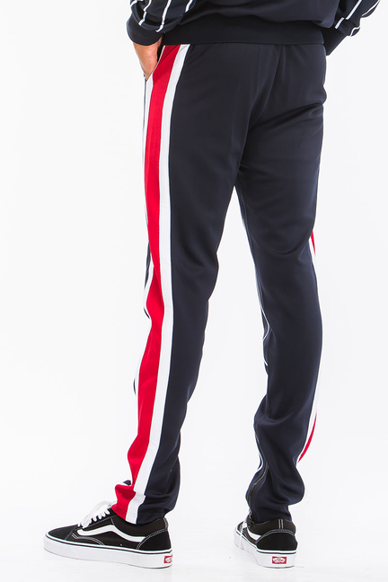 Navy track pants with white pinstripes and red side stripe