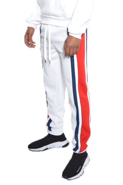 White cotton sweat pants with drawstring and vertical red/blue side stripe