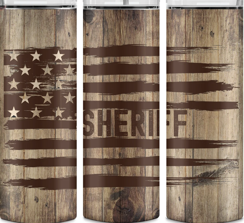 Stainless steel tumbler with rustic wood print and star-and-stripe sheriff graphic