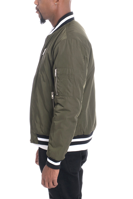 Men's olive twill jacket side view with zip sleeve pocket and ribbed cuffs