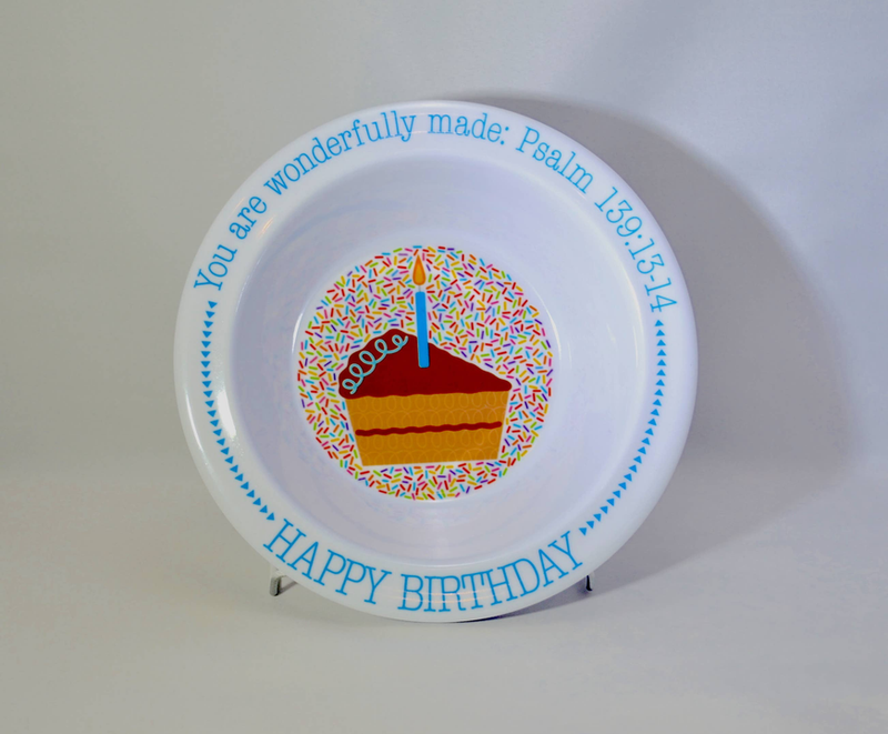 Round white birthday bowl with sprinkles cake center and 'Happy Birthday' blue text