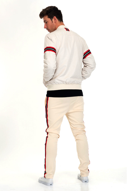 Beige tracksuit set with white jacket and pants, red and navy stripe accents