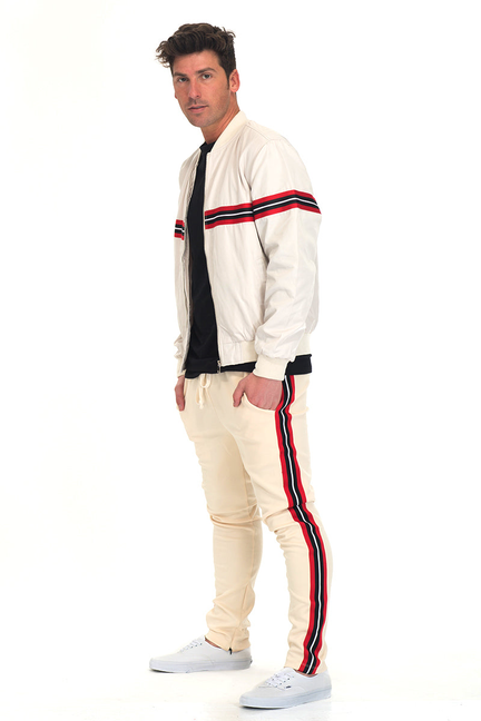 Beige tracksuit set with white jacket and pants, red and navy side stripe panels