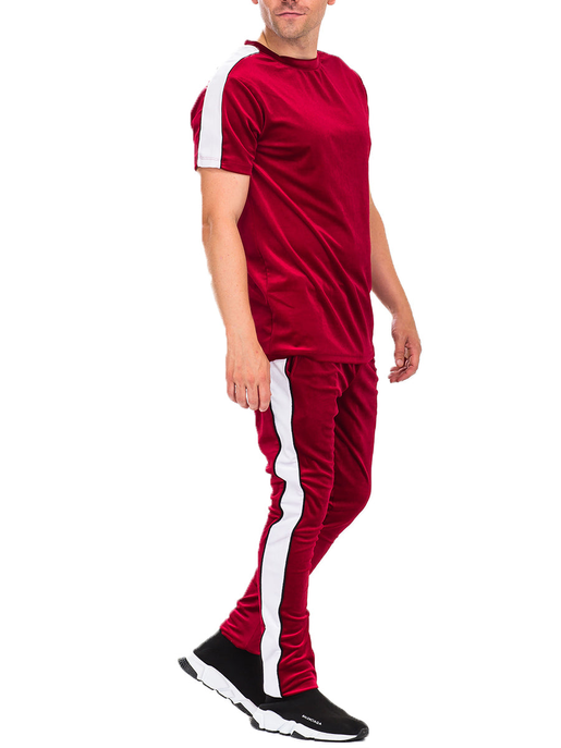 Velvet set: short-sleeve crewneck top and tapered joggers with white side stripes.
