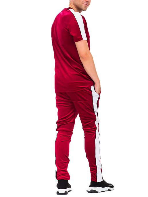 Velvet set: short-sleeve top and joggers with white trim along sides and cuffs.